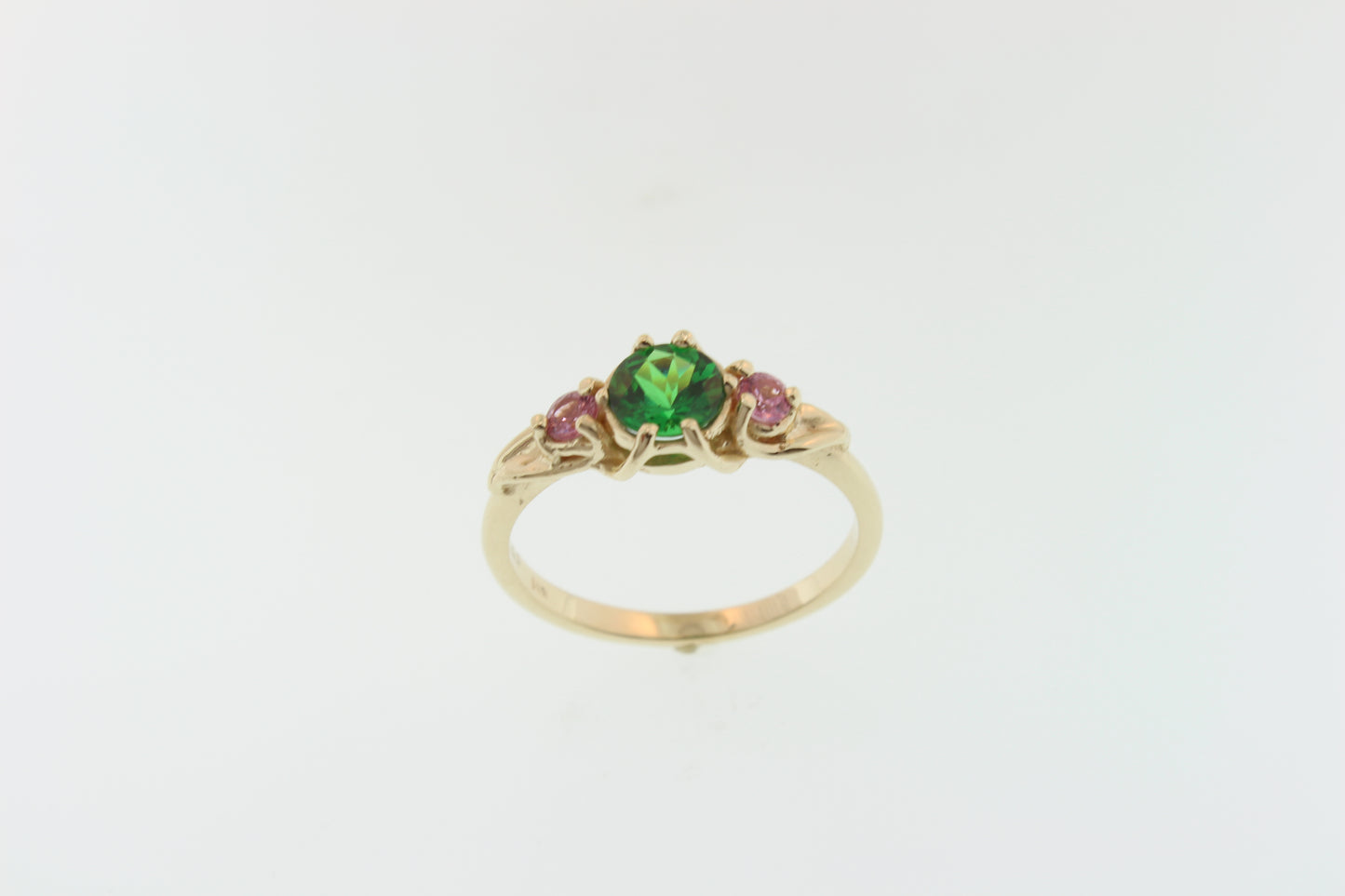 Brilliant Green Garnet and pink Sapphire ring. Set in 14k recycled yellow gold.